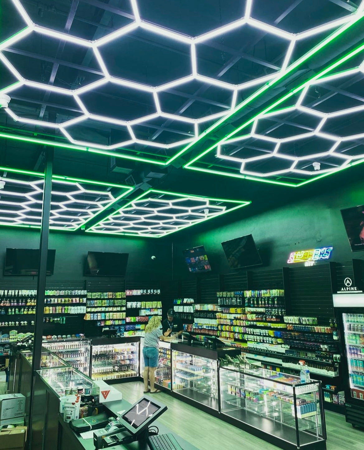 Hexagon lighting on ceiling with green LED border
